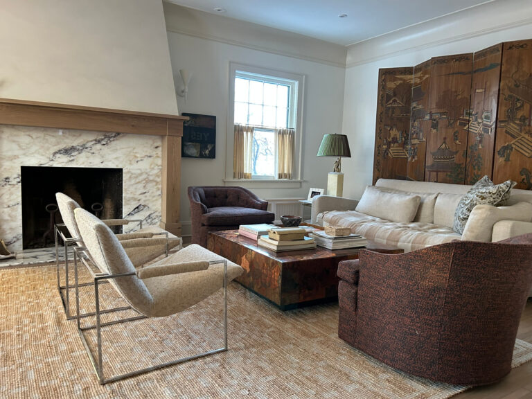 living room corner with window, fireplae, and furniture arrangement, coromandel screen